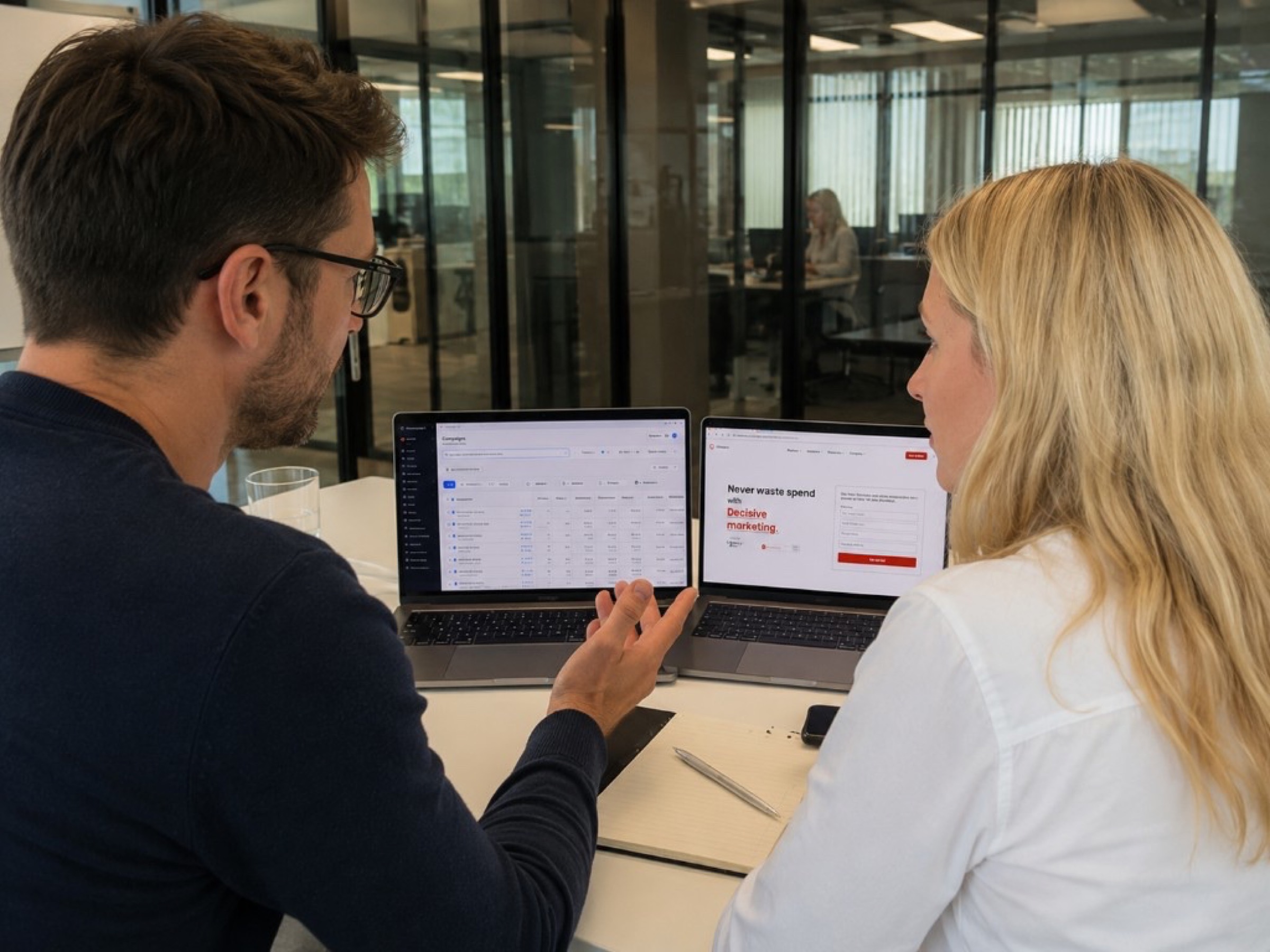 Decima team member reviewing marketing performance on screen